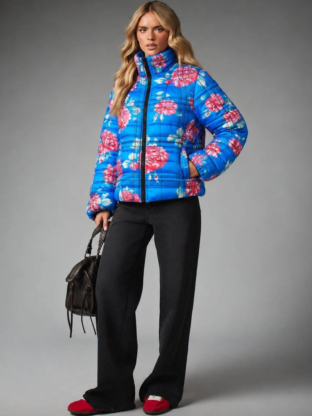 Blue floral puffer jacket with pink flowers — full outfit view