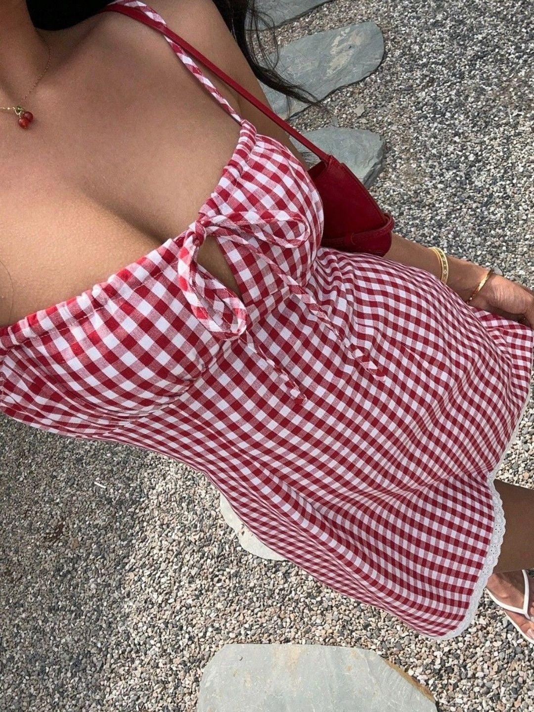 Red and white gingham sweetheart mini dress — neckline detail view