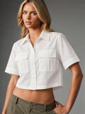 Front view of Clean Slate White Utility Crop Shirt with short sleeves and flap chest pockets