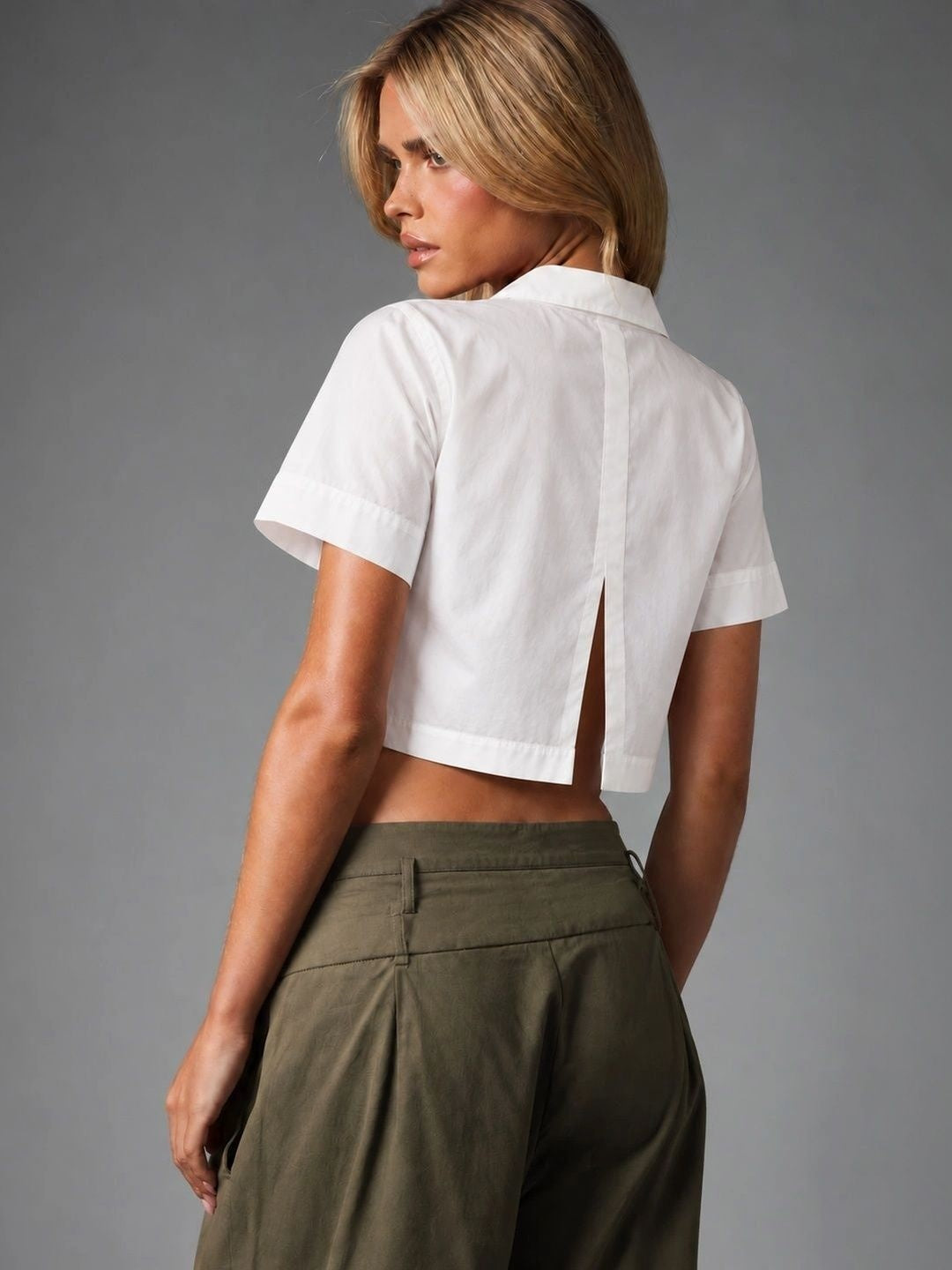 Back view of Clean Slate White Utility Crop Shirt showing the center back detail