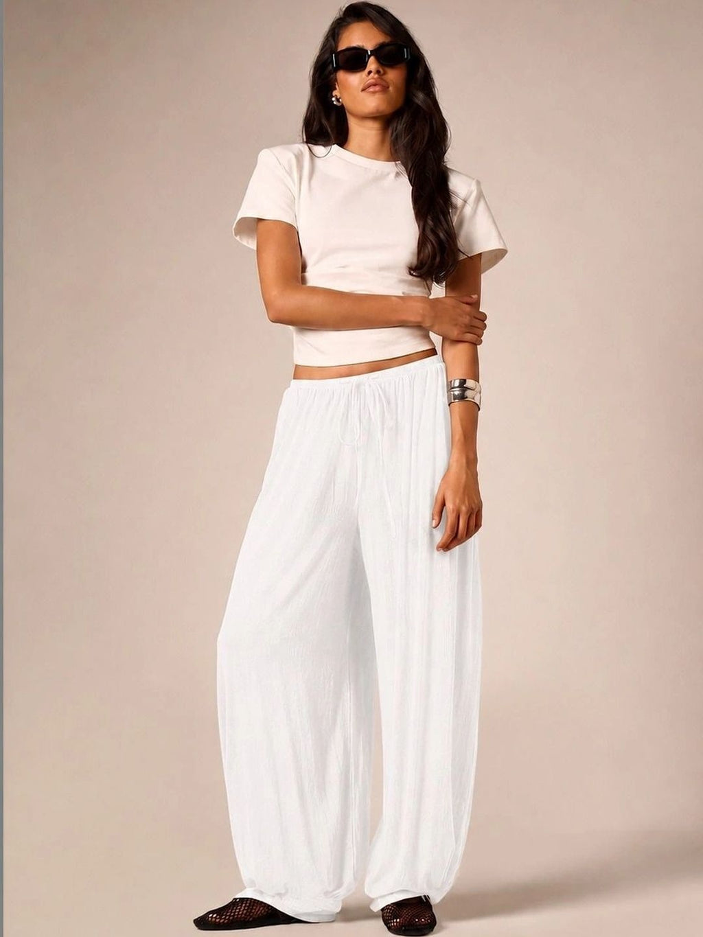 White textured wide-leg track pants — full outfit view