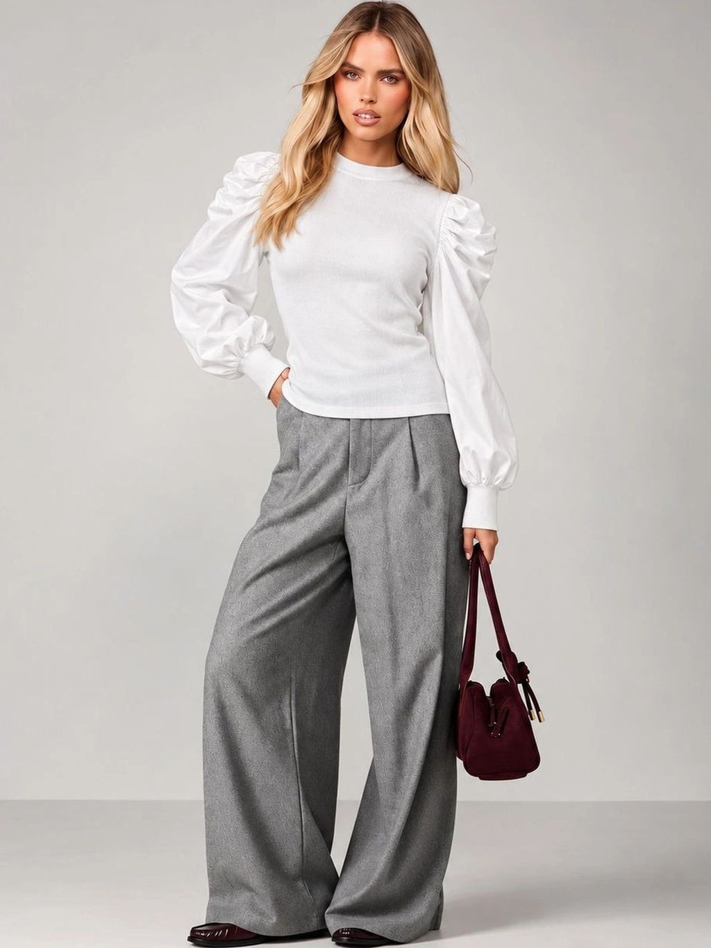 Full-length outfit featuring Cloud White Sculpted Puff-Sleeve Top with grey trousers