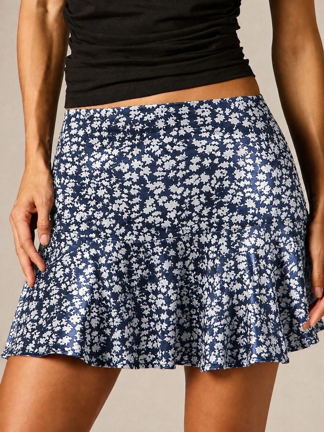 Navy and white ditsy floral mini skirt — front detail view