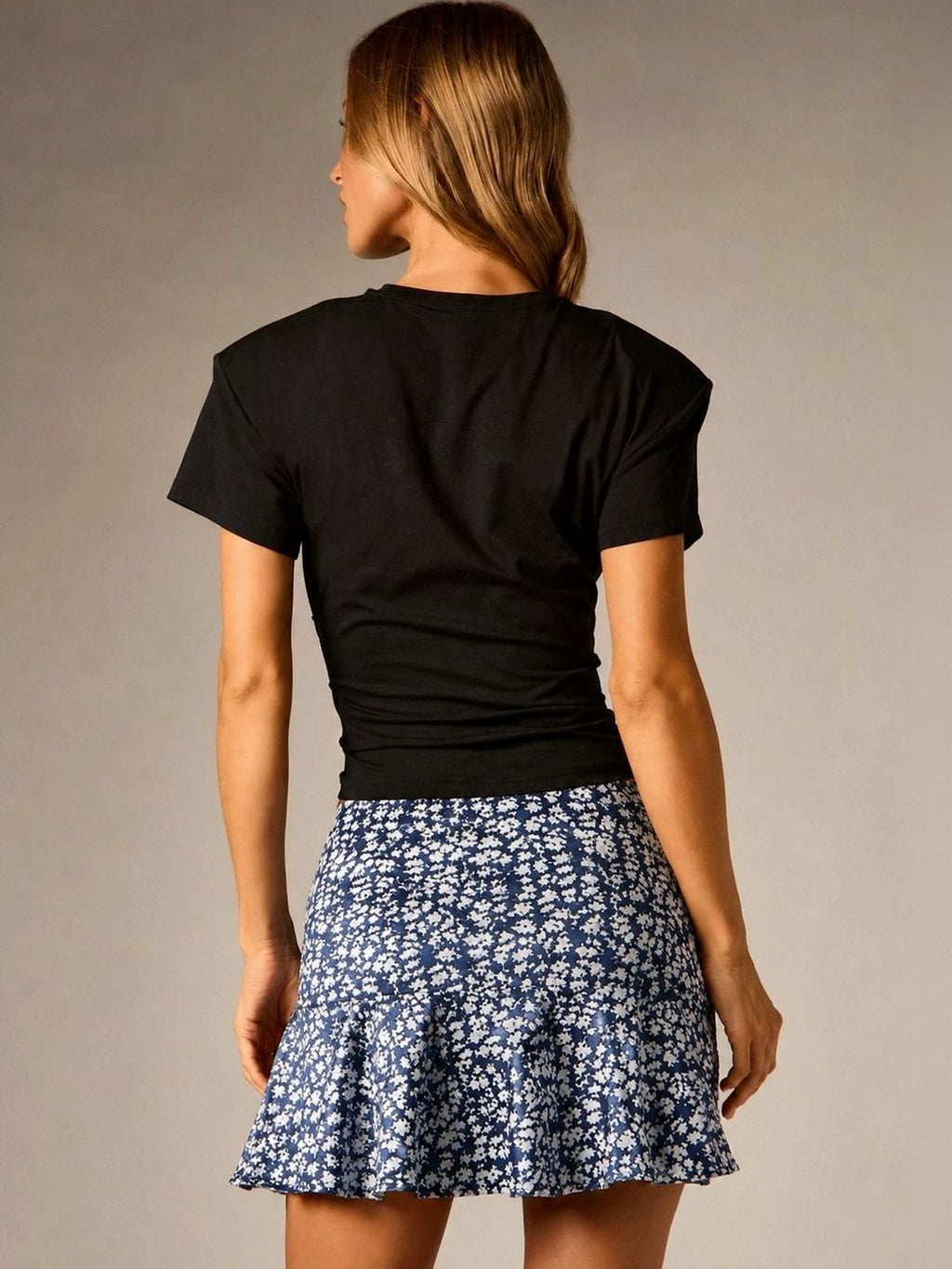 Navy and white ditsy floral mini skirt — back view