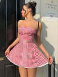 Red and white gingham strapless fit and flare mini dress, front view