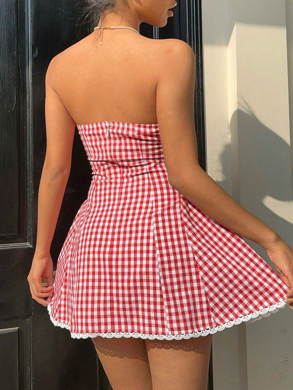 Red gingham strapless mini dress, back view